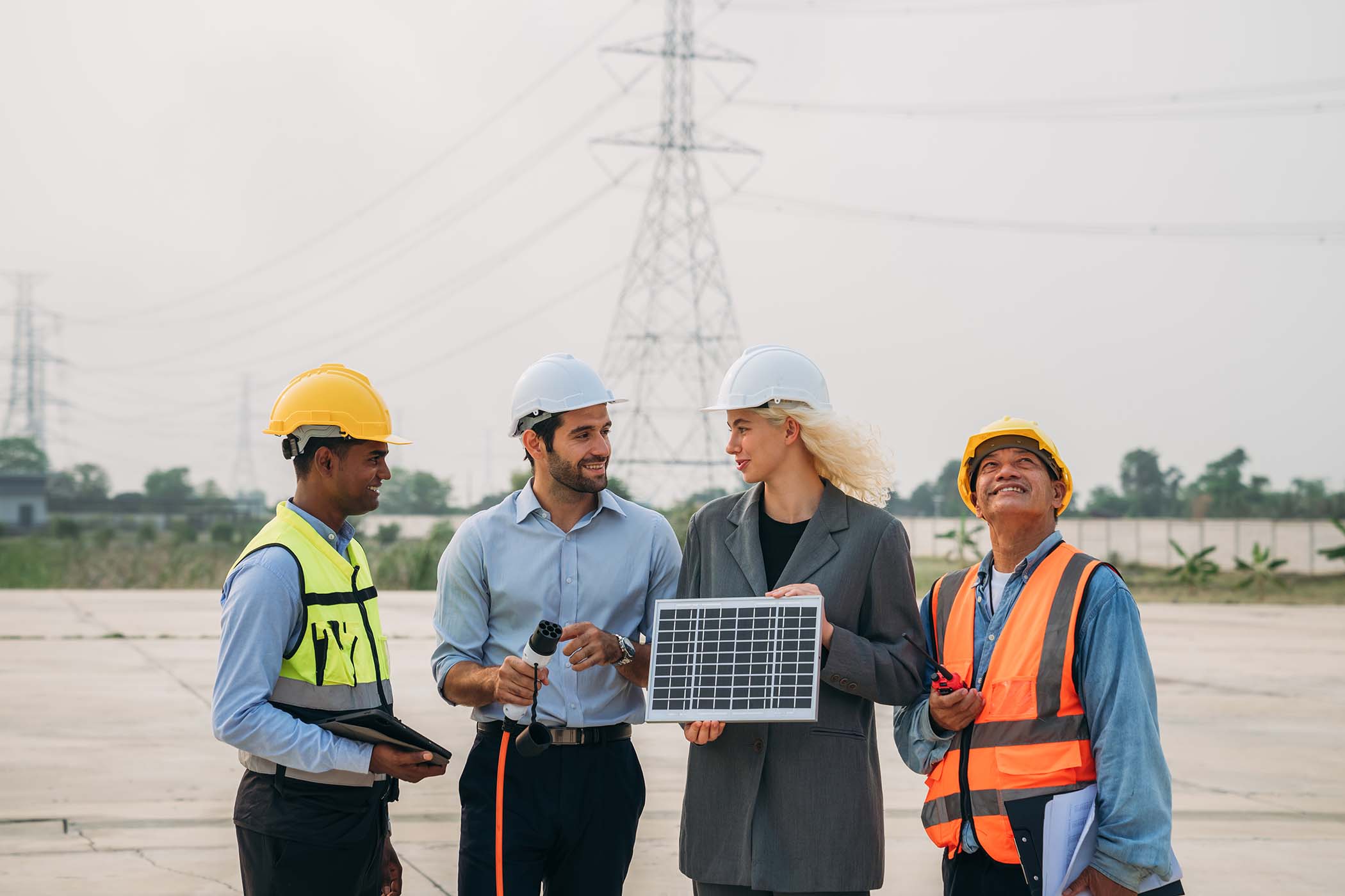 a group of construction workers are standing aroun vlhz2d5.jpg