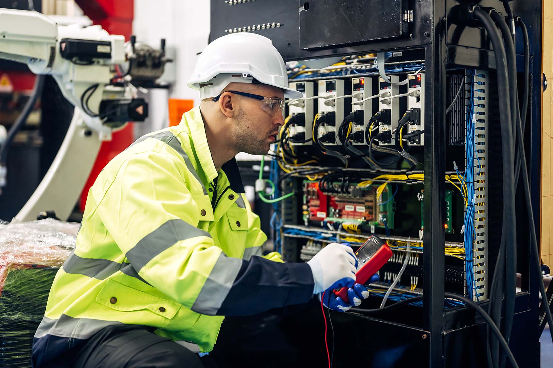 technician engineer holding robot controller check xfce4m4.jpg